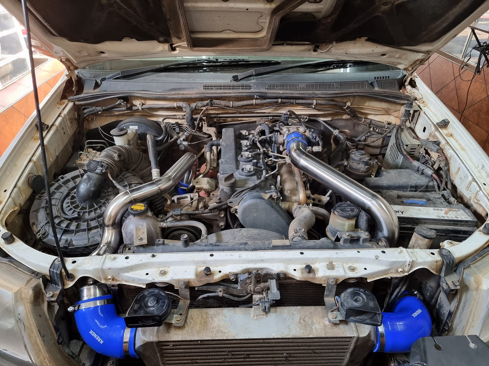 Twin turbo engine bay modification